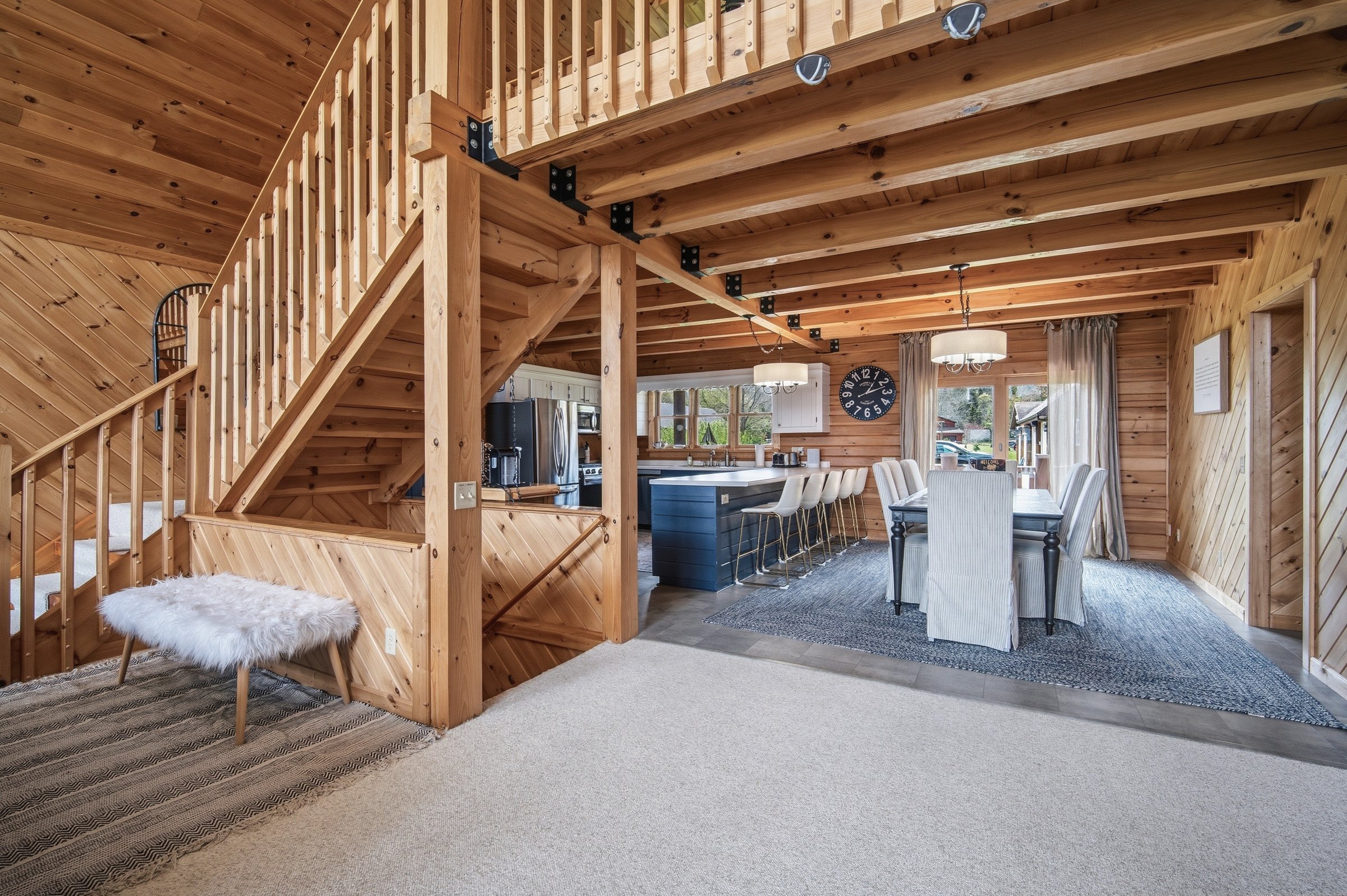 Kitchen, dining, and staircase overview