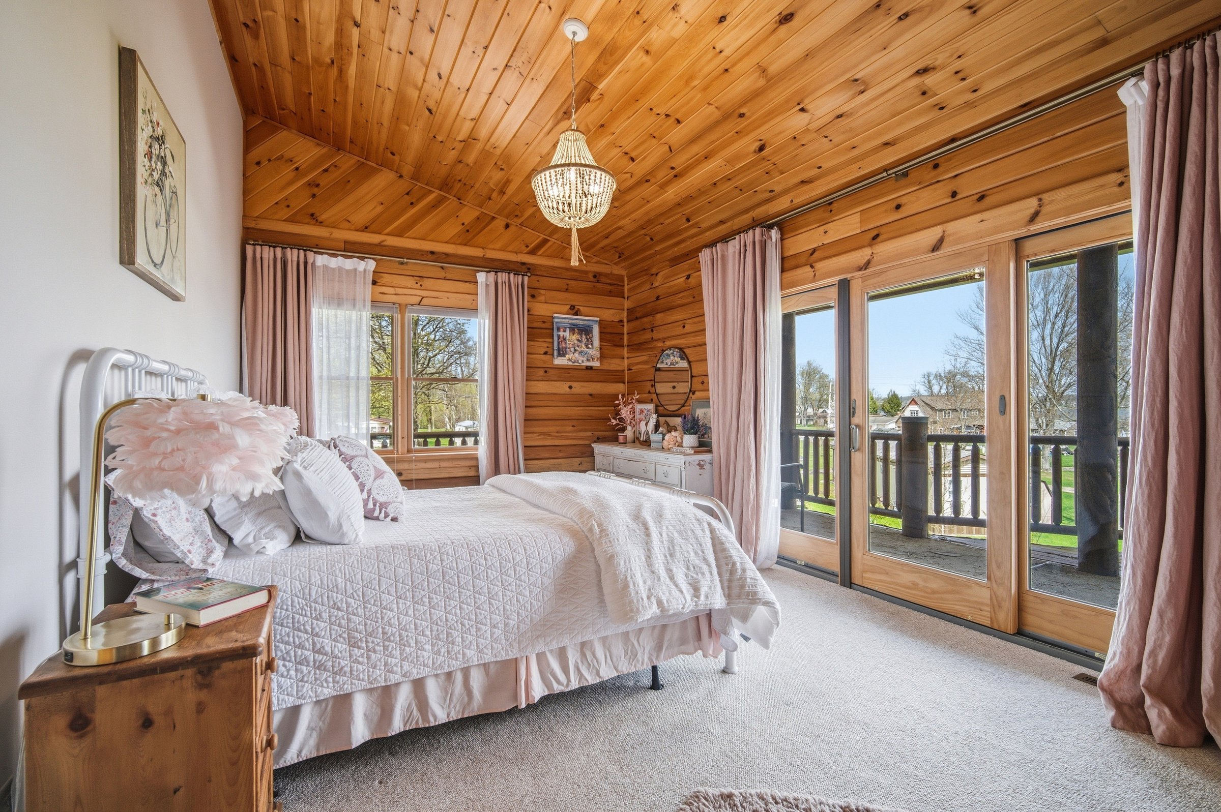 Bedroom with sliding doors to the deck